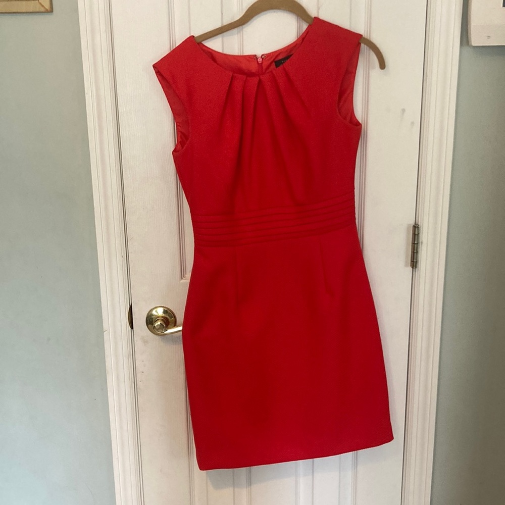 Red Tahari dress. Sleek calf length.